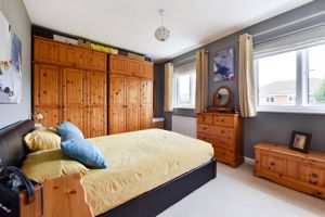 Bedroom One- click for photo gallery